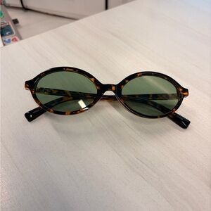 Free People Tortoiseshell Oval Sunglasses with Green Lenses